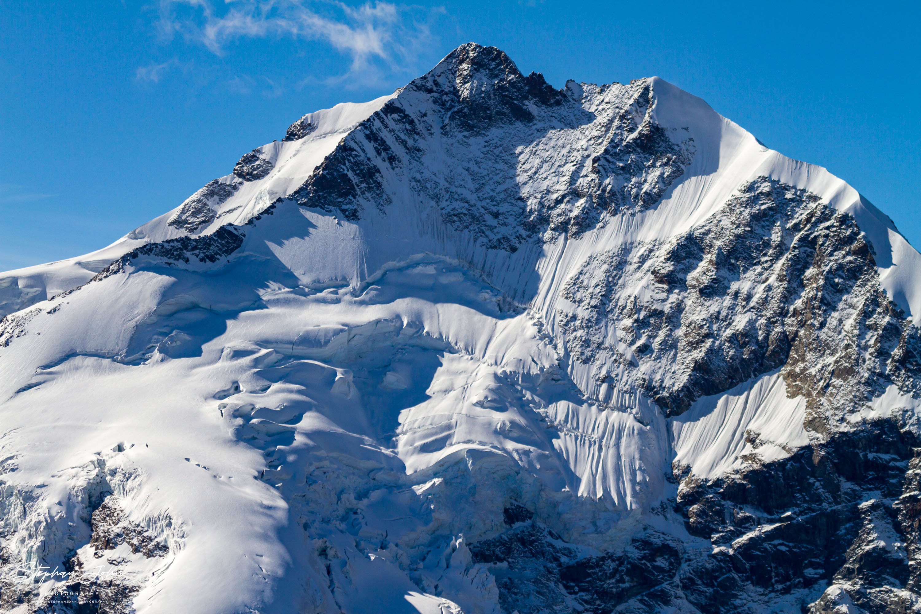 Blick vom Munt Pers in die Bergwelt